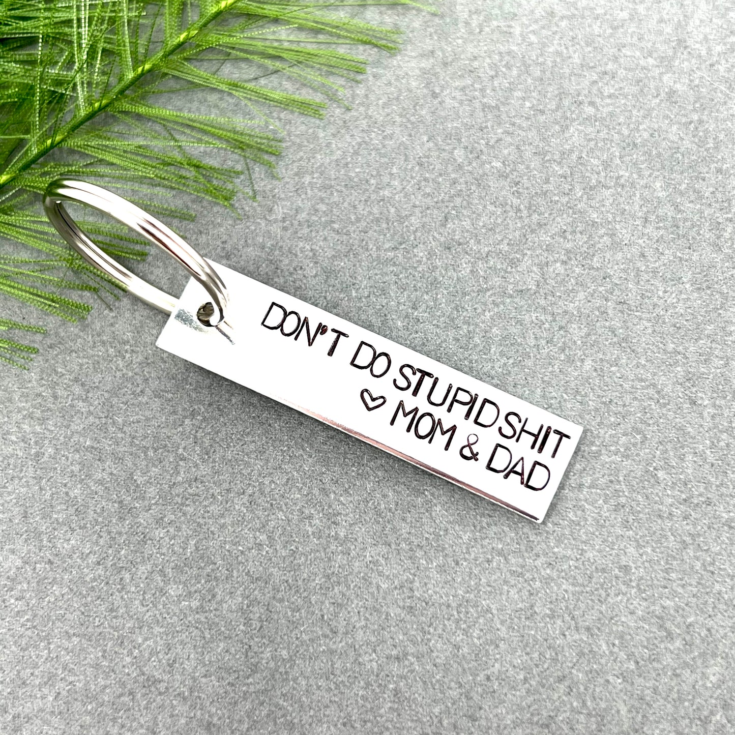 Don't Do Stupid Shit Keychain From Mom & Dad